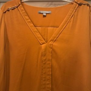 Top with gold accents